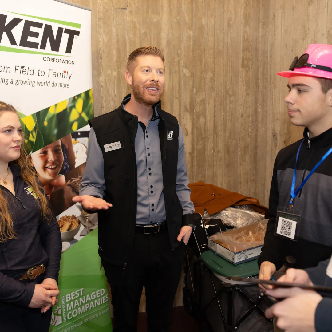 business rep talking to students